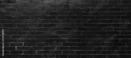 Photo black brick wall, brickwork background for design