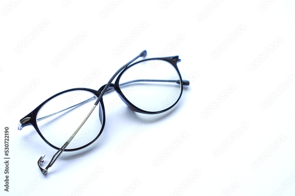 black broken old glasses isolated on white