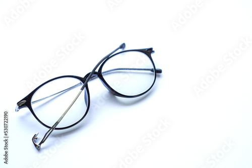 black broken old glasses isolated on white