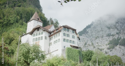 Wimmis, Switzerland, europe, rural, village, grape, vineyard, mountain, cloudy, castle, schloss, summer, green, hills, garden, clock tower photo