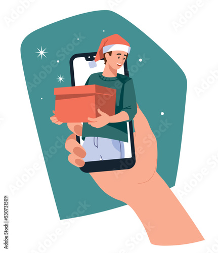 A man with a gift looks out of the phone. Online congratulations. The hand is holding a mobile phone. Vector illustration.