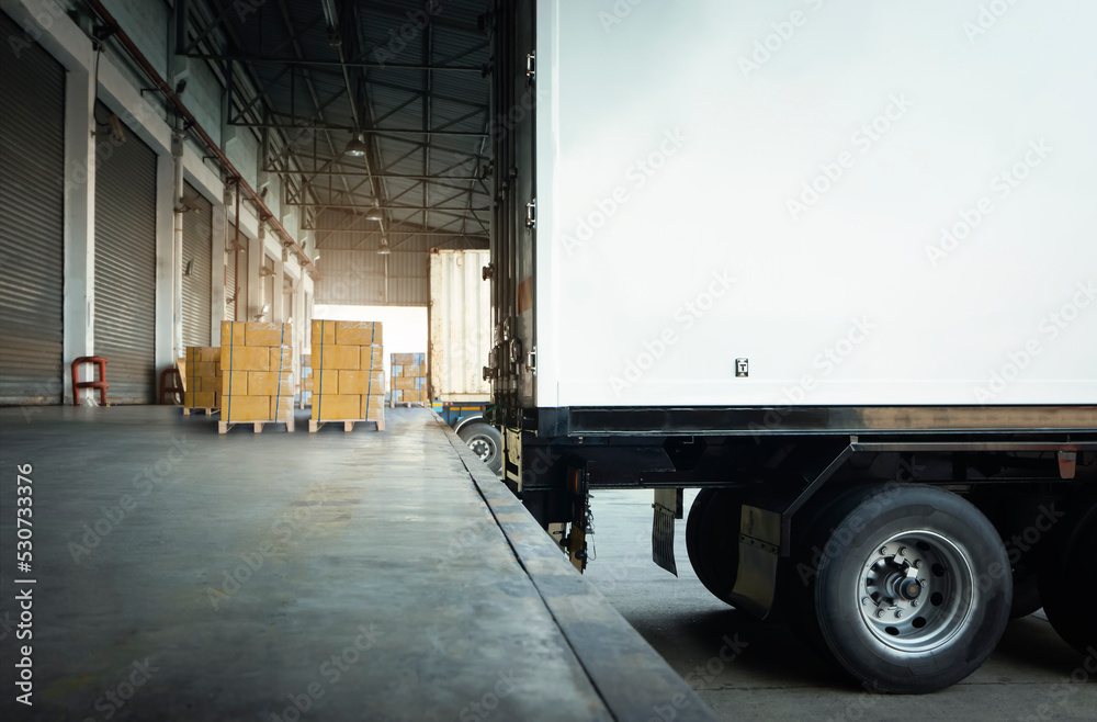 Shipping Cargo Container Trucks Parked Loading at Dock Warehouse. Goods Pallets. Delivery Trucks. Distribution Warehouse. Cargo Freight Trucks Transport. Warehouse Logistics.
Shipping Cargo Container Trucks Parked Loading at Dock Warehouse. Goods Pallets. Delivery Trucks. Distribution Warehouse. Cargo Freight Trucks Transport. Warehouse Logistics.
