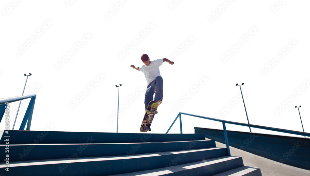 Skateboarder doing a trick isolated on white background Skateboarder doing a trick isolated on white background