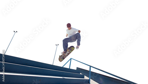 Skateboarder doing a trick isolated on white background