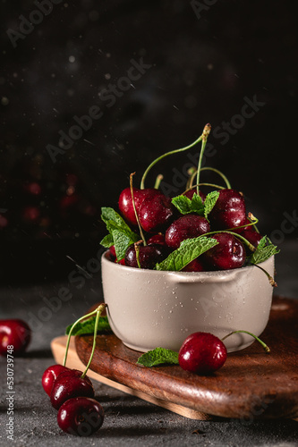 Fresh cherry in close up view on dark background