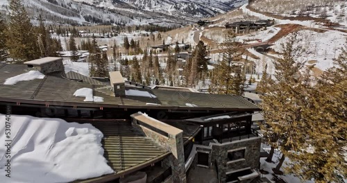 Park City Utah Aerial v51 cinematic low flyover the colony white pine canyon capturing hillside grand mansions, luxurious holiday retreat in winter wonderland - Shot with Mavic 3 Cine - February 2022 photo