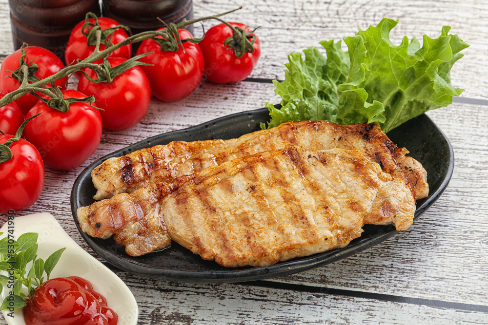 Grilled pork steak with ketchup Grilled pork steak with ketchup