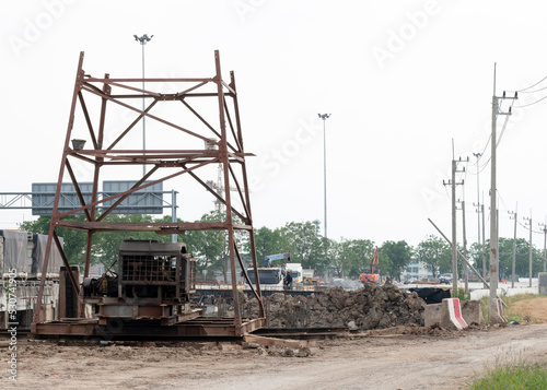 Derrick at road construction site