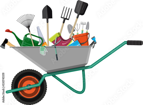 Gardening tools in wheelbarrow photo