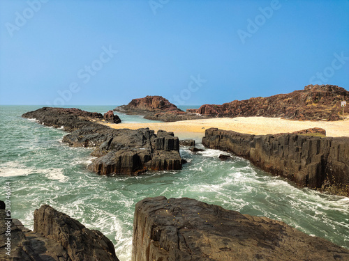 Basaltic rock formation in a hexagonal form beach in St. Mary island, Karnataka, India