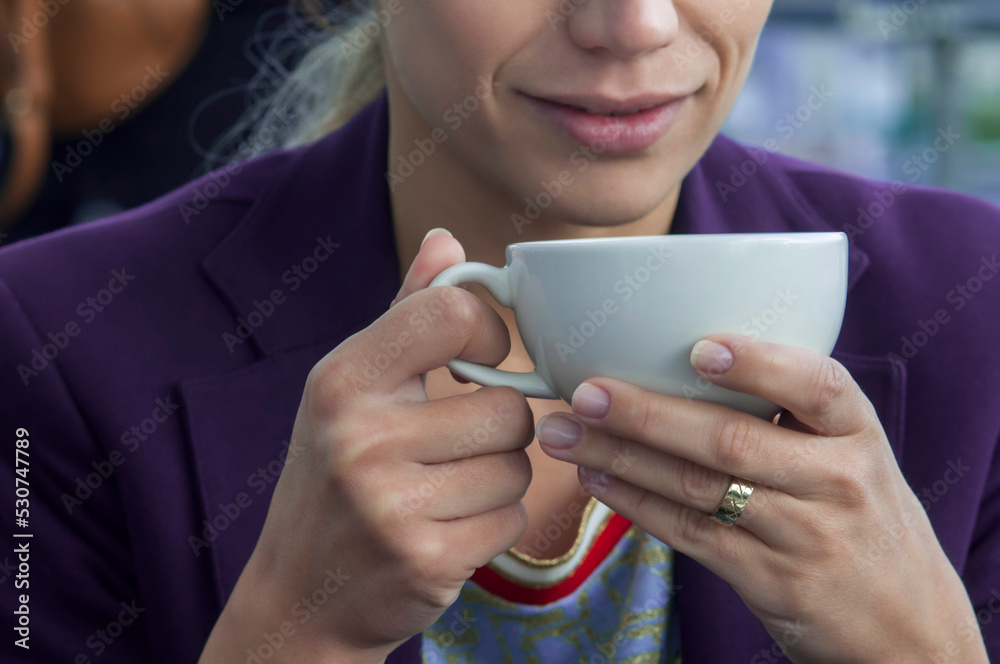 girl drinking cappuccino coffee in a cafe girl drinking cappuccino coffee in a cafe