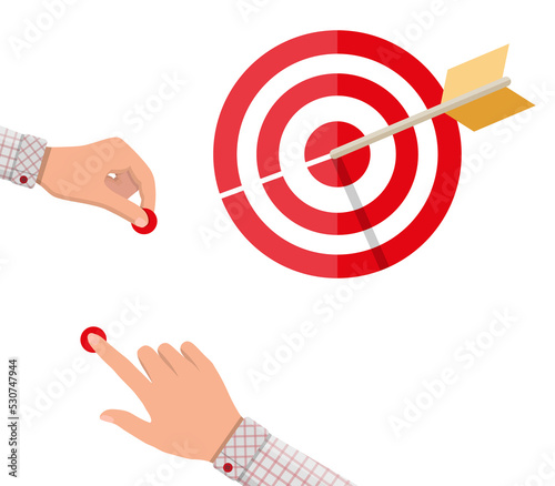 Hand pointing to arrow from target