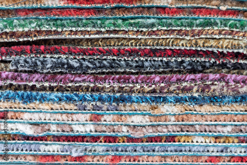 Stack of carpet of multi colors texture background