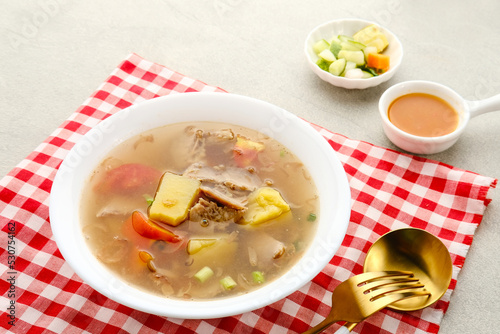 Soup, Sop Daging with vegetables is Indonesian traditional food, served in bowl
