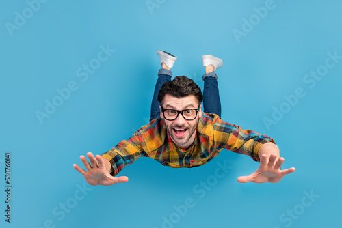 Wallpaper Mural Full length photo of satisfied glad person toothy smile fall flying isolated on