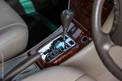 automatic transmission shift selector in the car interior. Closeup a manual shift of modern car gear shifter. 4x4 gear shift	