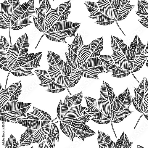 Abstract seamless floral pattern with maple leaves. Black and gold. Vector illustration.