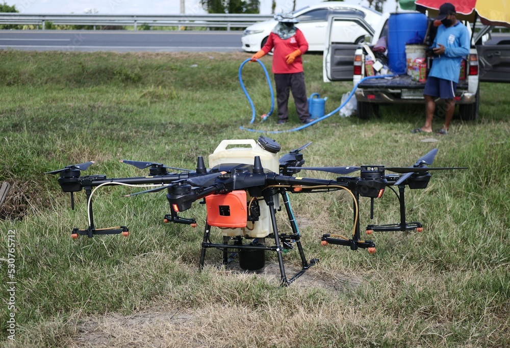 drone for agriculture. drone for spraying chemicals in rice fields. Technology for Agriculture 4.0 in Thailand