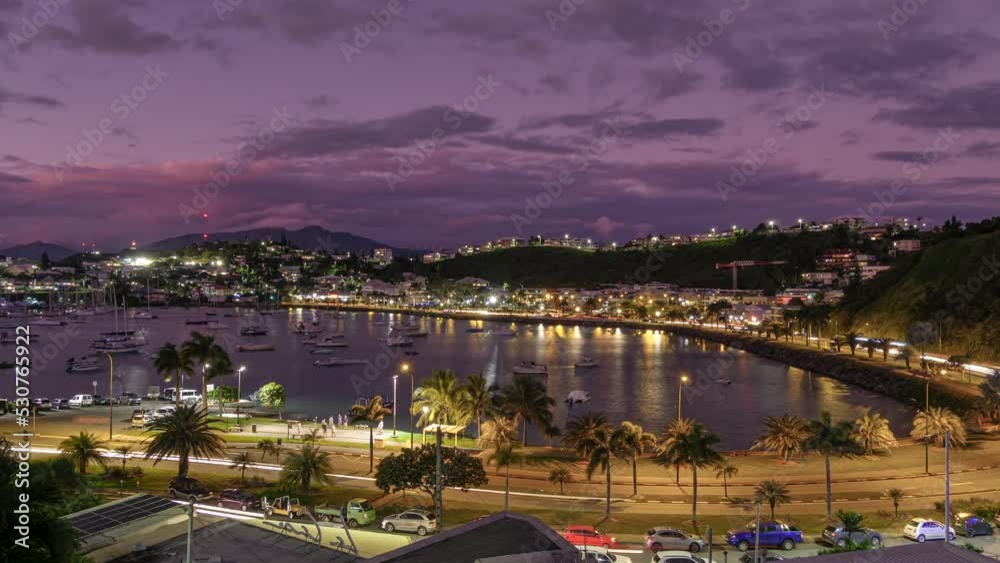 Beautiful sunset to night timelapse of Noumea traffic around Orphelinat Bay.