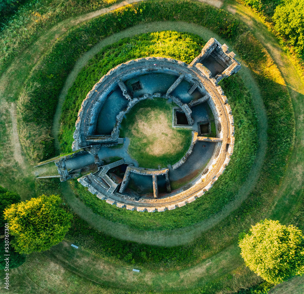 Aerial view of Restormel Castle at sunset near Lostwithiel, Cornwall, United Kingdom. Aerial view of Restormel Castle at sunset near Lostwithiel, Cornwall, United Kingdom.