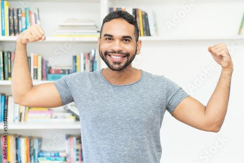 Cheering hispanic hipster man with beard © Daniel Ernst