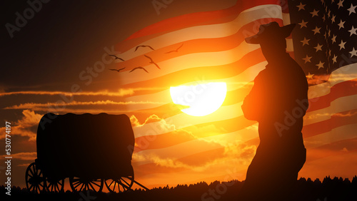 Fotografiet American settler on national flag background. USA. Pioneer.