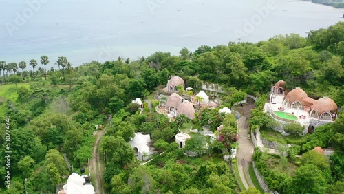 beautiful pool villa with ocean view of Mentigi Bay on Lombok Island, aerial photo