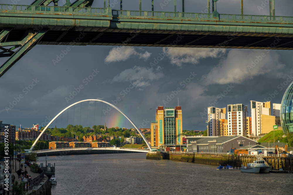 Fototapeta premium Rainbow over Millennium Bridge Newcastle