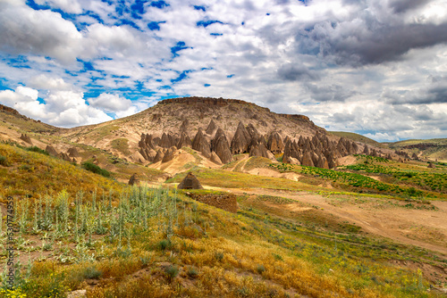 buildings carved into the rock in yaprakhisar photo