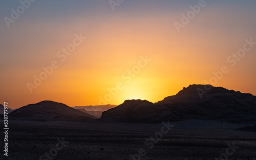 Desert landscape at golden hour at sunset in the Wadi Rum desert, Jordan