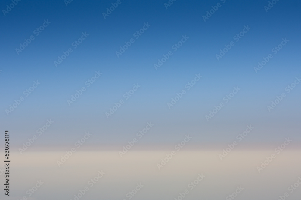 Obraz premium blue sky and soft white clouds during a flight on vacation
