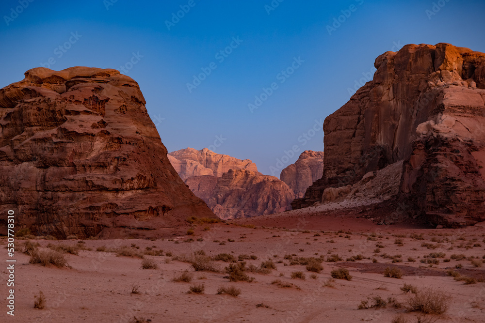 Desert landscape at golden hour at sunset in the Wadi Rum desert, Jordan