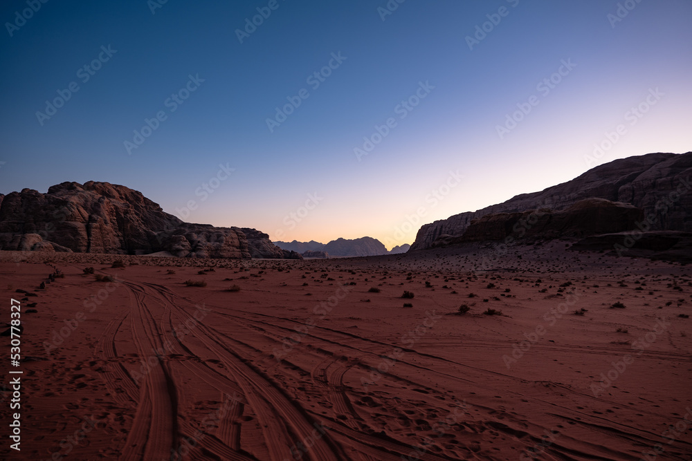 Desert landscape at golden hour at sunset in the Wadi Rum desert, Jordan