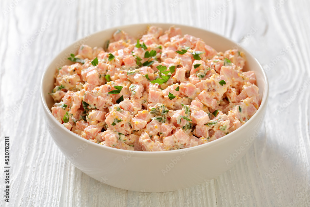 classic ham salad on white plate, top view classic ham salad on white plate, top view