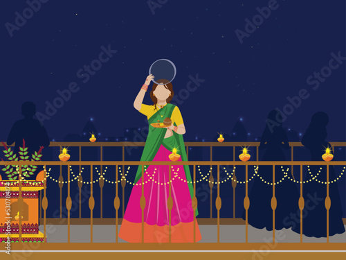 Indian Hindu Festival Karwa Chauth Concept with Young Woman Performing Ritual in the Night