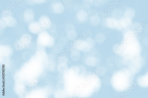 Abstract light blue blur bokeh for background, light blur on high light blue gradient abstract background in central design for presentation.