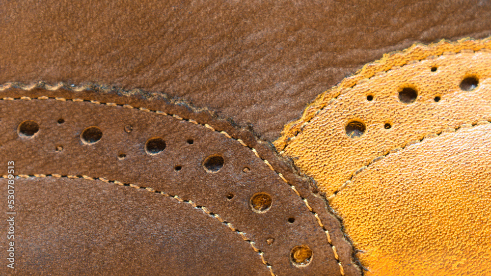 Stitched perforated genuine brown leather