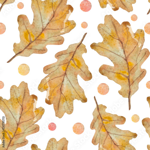 Seamless watercolor pattern of autumn yellowed oak leaves on a white background with the addition of bright polka dots.