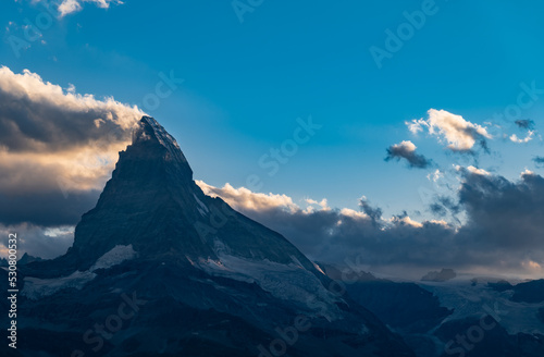 Matterhorn peak as seen from Lake Stellisee before sunset, Zermatt, Switzerland