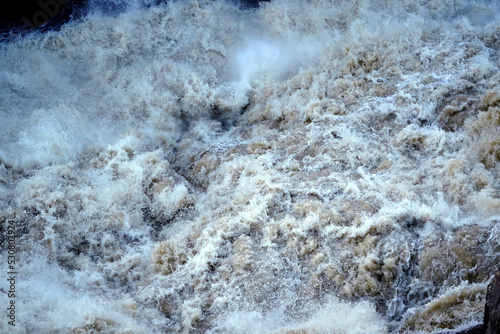 Torrential river waters in a flood © fivepointsix