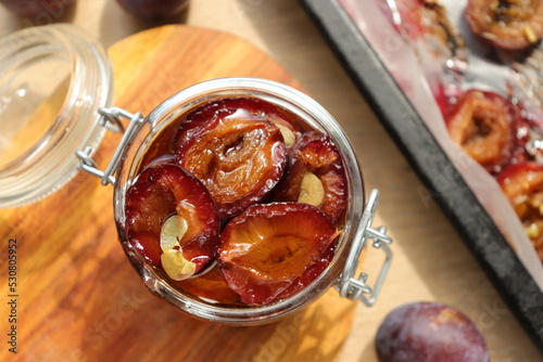 plum dried in the oven with spices and garlic for harvesting for the winter in jars delicacy