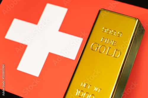 gold bar is on the national flag of switzerland, swiss Gold Reserve concept photo