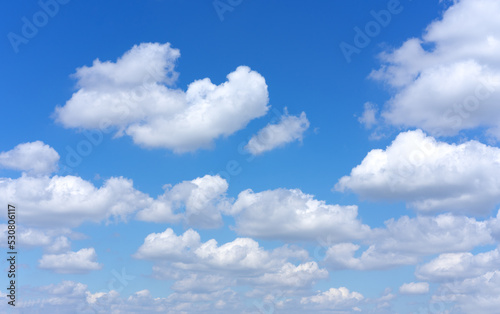 Clear blue sky background with white clouds © fotofabrika
