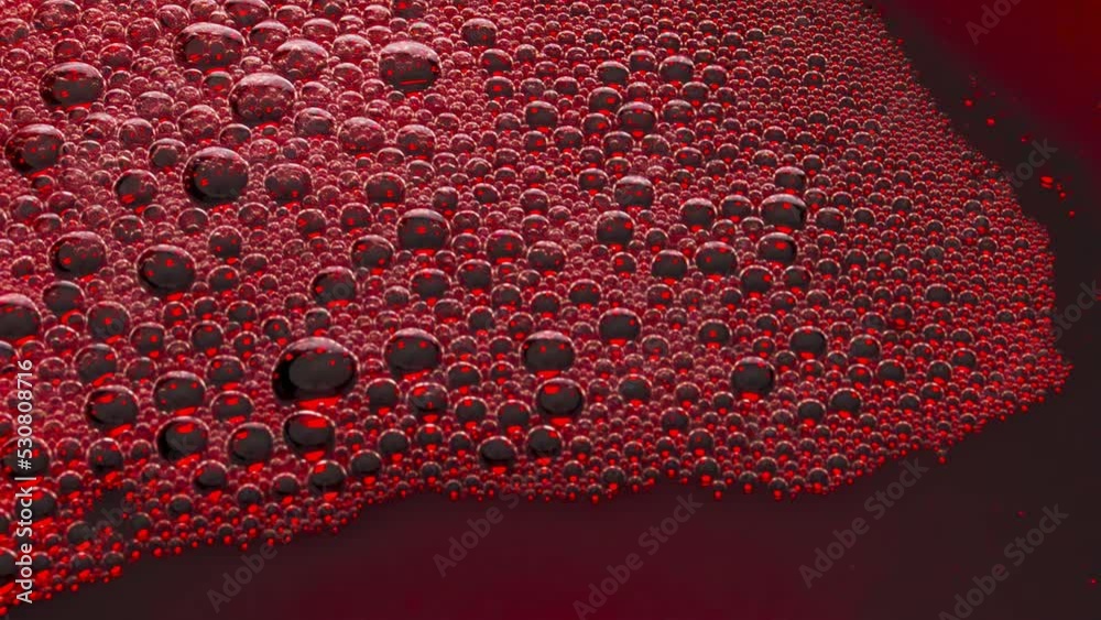 Foamy alcoholic drink surface top view. Wine bubbles bursting slowly closeup