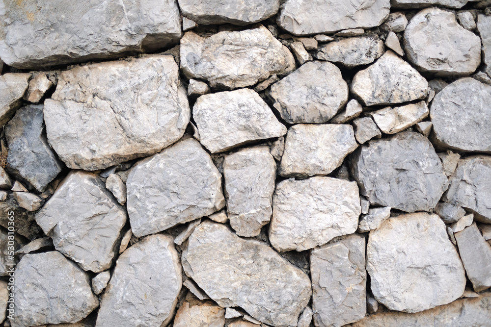 Old castle stone wall texture background close up Old castle stone wall texture background close up
