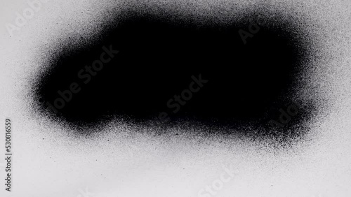 Black spray paint on a white background. Overlay.