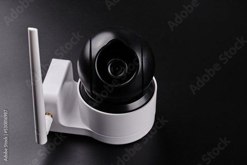 Surveillance camera, videcam, cctv camera isolated on black background close up. home security system concept