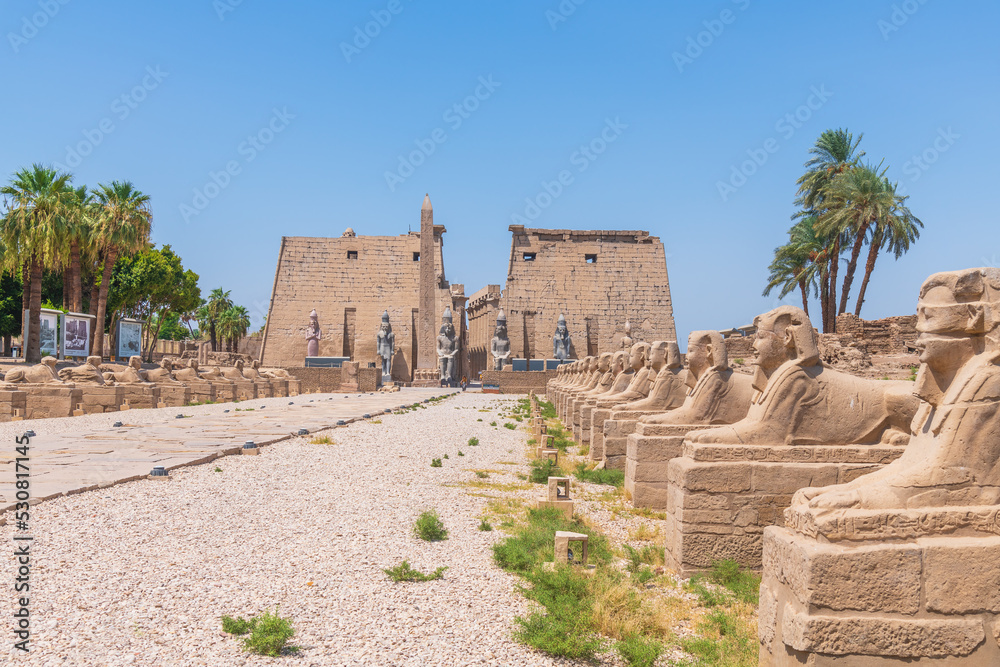Luxor, Egypt; August 22, 2022 - The Avenue Of The Sphinxes, leading to the beautiful Luxor Temple in the middle of Luxor town, Egypt.