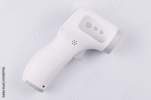 Temperature Measurement electronic Device. Isometric Digital Infrared Non-Contact Thermometer Gun isolated on white background. medical diagnostic and healthcare concept
