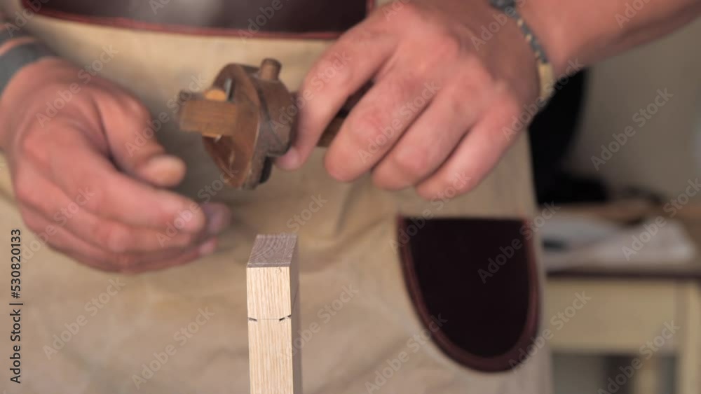 woodworker mark detail with marking gage